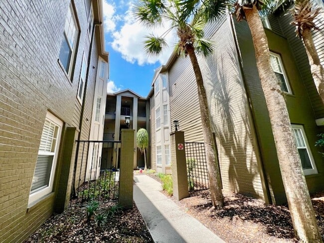 Building Photo - NEW-Remodeled bathroom & kitchen! NEW VINYL PLANK flooring & fresh paint! 2 bedroom 1 bath condo ...
