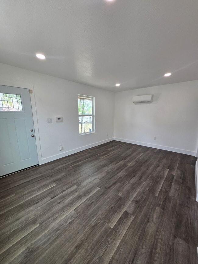 Photo - New paint and flooring throughout.