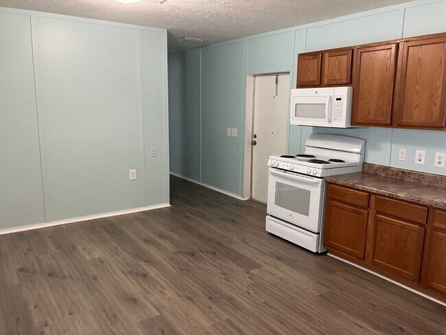 Photo - Single wide trailer on block foundation - ...