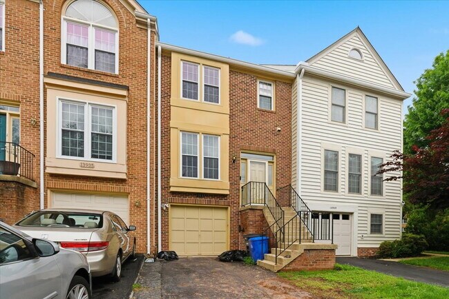 Photo - Welcome home to this beautifully updated and move-in-ready 3-bedroom, 3.5-bath townhouse