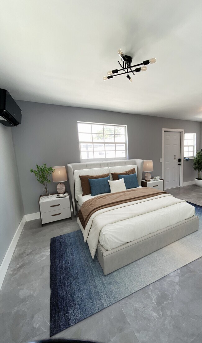 Virtually staged bedroom - 2420 SW 11th St Apartments Unit C