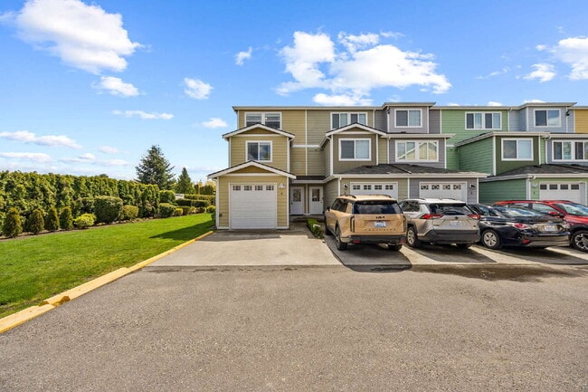 Photo - 4 bedrooms, 2.5 bathrooms with attached garage. This large unit is 3 floors!  Rent of $2900.00 in... Unit 6