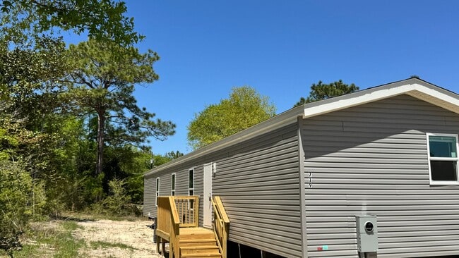 Photo - SPECTACULAR WATER-VIEW W/ LARGE DECK NEWER MOBILE HOME