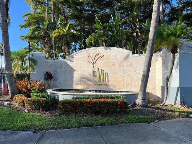 Building Photo - 9610 NW 2nd St Unit 8-201