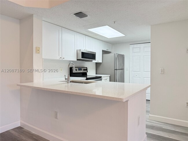 Photo - 5045 Wiles Rd Unit 303
