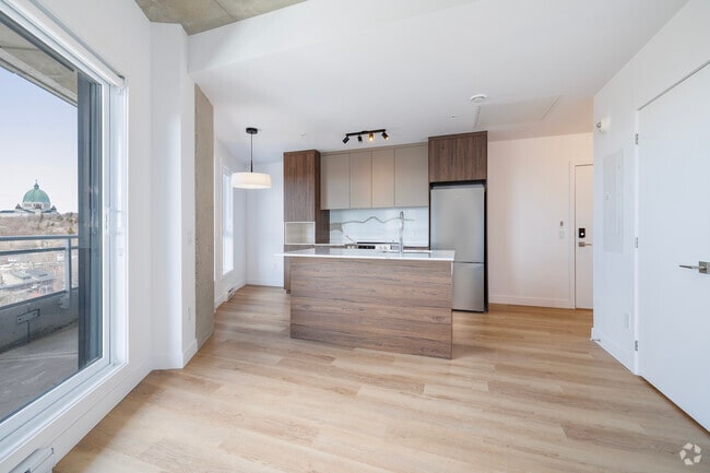 1BR, 1BA - 589SF - Kitchen - Le Loyal – condos locatifs