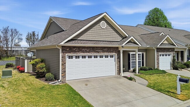 Photo - Experience refined, low-maintenance living in this beautifully appointed end-unit townhome