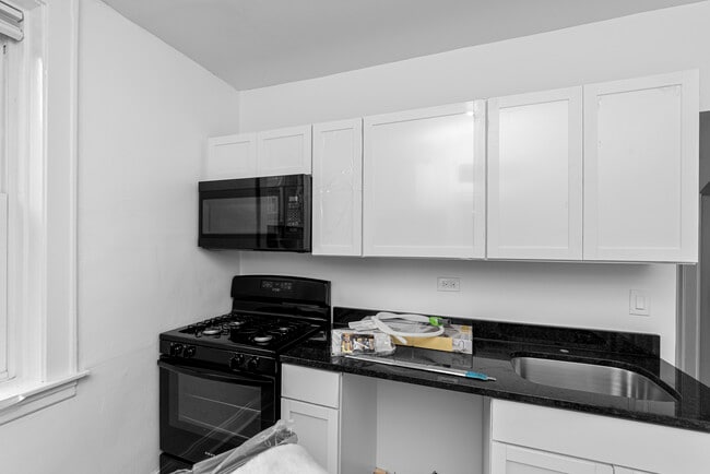 Building Photo - 1934 W Estes Ave Unit 34-2E