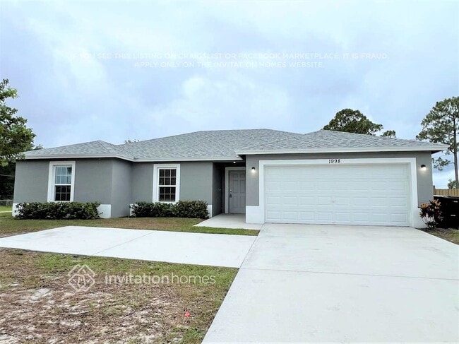 Building Photo - 1998 SW Airoso Blvd Rental