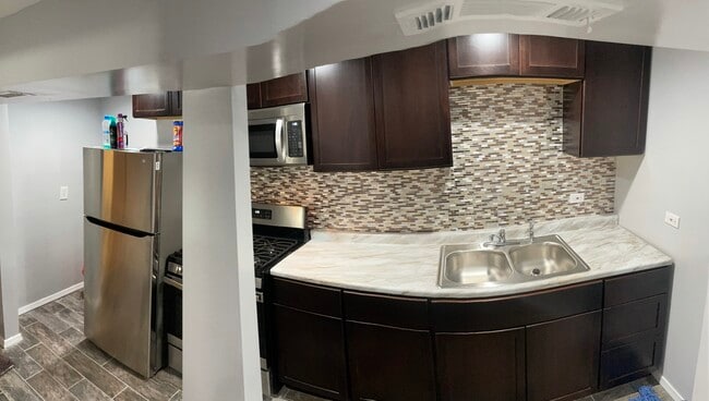 Photo - 1518 E 72nd St Apartments