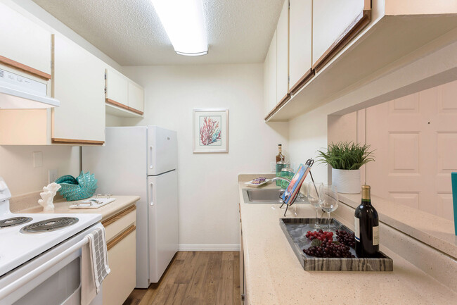 Kitchen (cabinets & appliances vary) - Harbor Beach Apartments