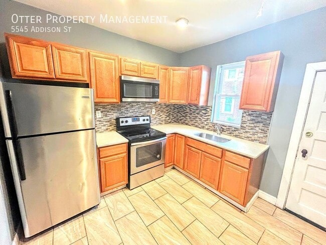Building Photo - 5545 Addison St Rental