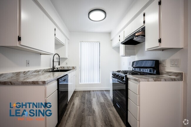 Building Photo - 14201 Victory Blvd Unit 211D Rental