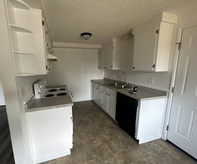 Photo - 2BD/1BA Duplex with large fenced yard Available June 5th!