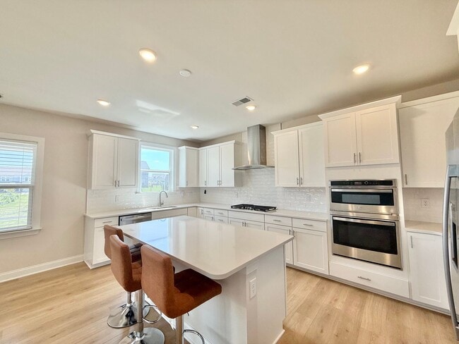 Photo - Luxurious 5BD, 4.5BA Holly Springs Home in an HOA Community with Resort-Style Amenities near Down...