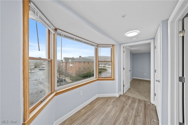 Building Photo - 1735 Merriman Rd Unit 301