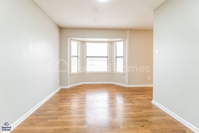 Photo - Move-In Ready Gem with Massive Fenced Yard & Private Deck!