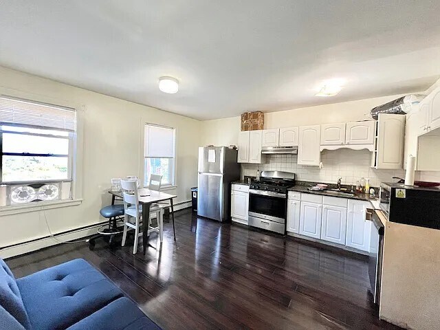 Building Photo - 1576 Tremont St Unit 2