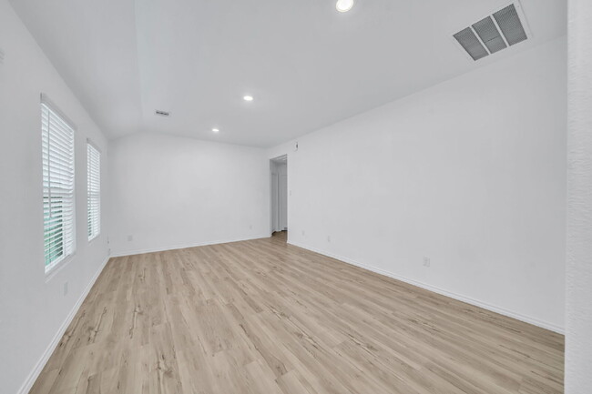 Photo - Like-new three bedroom single story home featuring a spacious open floor plan ideal for modern li...