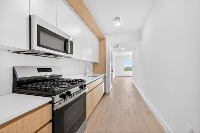 Photo - New Construction - No Broker Fee - Central A/C - W/D - Balcony Unit 201