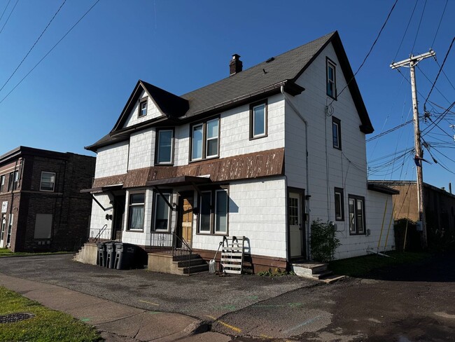 Building Photo - 113-115 N 22nd Ave W Unit 115 1/2