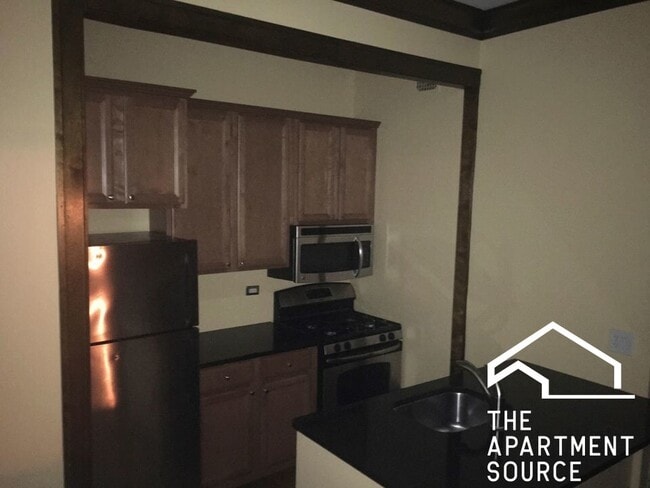 Photo - 4755 N Sawyer Ave Unidad 2H