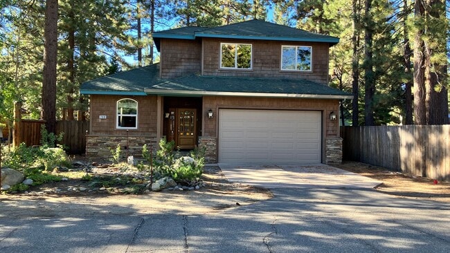 Building Photo - Large home with garage and fenced backyard