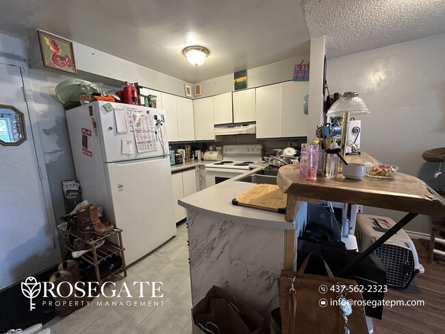 Building Photo - Pet-Friendly 1-Bedroom Corner Apartment with Walk-In Closet & Backyard in Kitchener Unit 29