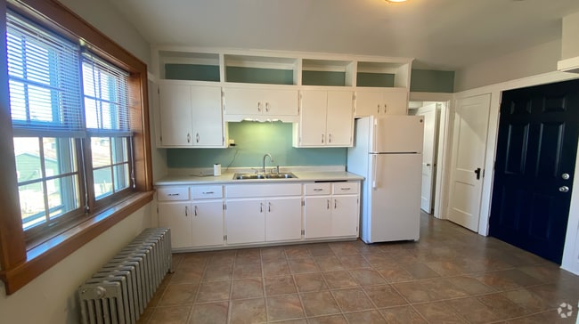 Building Photo - 1802 E Howard Ave Unit 3 Rental