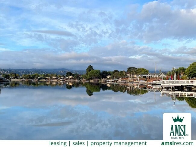 Building Photo - Rare prime waterfront home right on the San Mateo Lagoon, available August 15th!