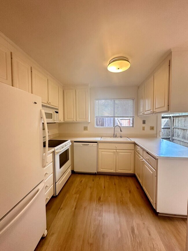 Photo - Unit with updated flooring!