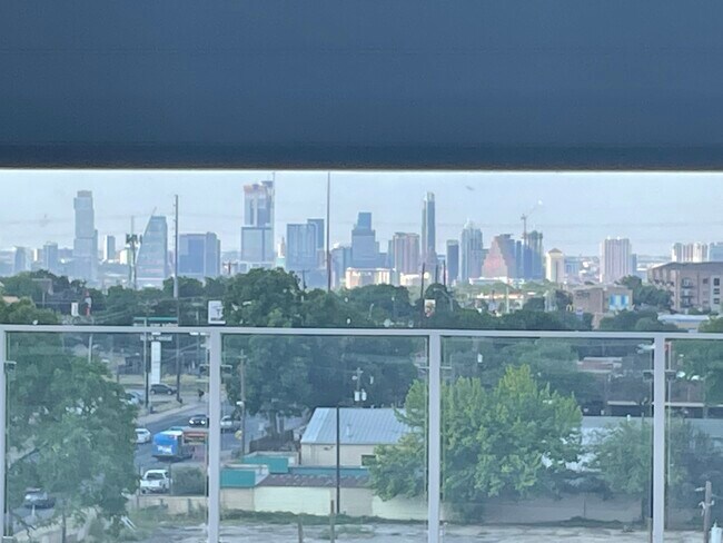 View of downtown from the gym treadmills. - 4361 S Congress Ave Unit Public Lofts 121