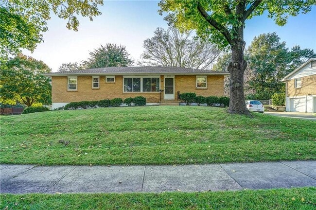 Photo - Coming Soon - Charming 3-Bedroom Home with Fenced Yard & Spacious Deck in Kansas City