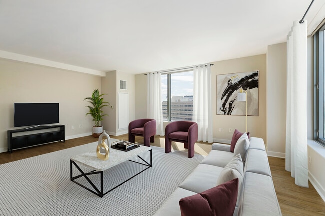 Renovated Package I living room with hard surface flooring