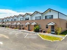 Building Photo - 1711 Dixon Blvd Unit 208