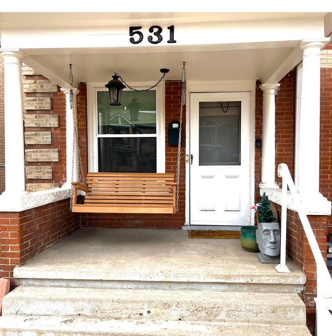 front porch - 531 N Logan St House