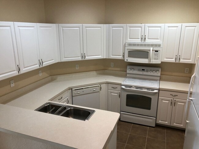 Photo - Must See! Beautiful 3 room /2.5 bath Gated Community W/ Pool Close to the Skyway