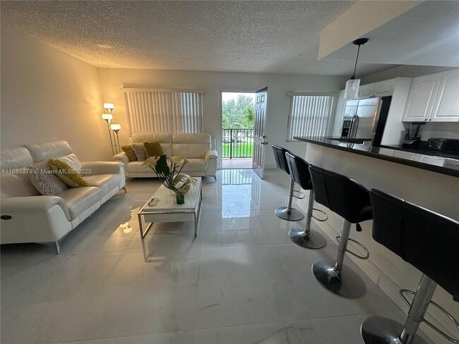 Building Photo - 13255 SW 9th Ct Unit 307G