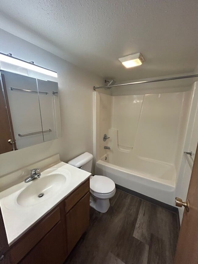 Photo - MOVE-IN Ready - 2 bedroom, One Bath - Top Floor with Vaulted Ceilings! Unit 47