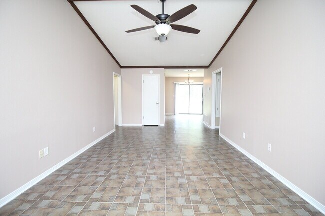 Photo - -Bed, 1.5-Bath Duplex in Bellview with Garage, Indoor Laundry, and Private Fenced Backyard
