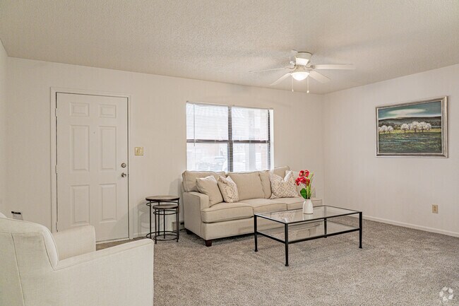 f1BR, 1BA - 650SF - Living Room - Wesley South at East Carolina