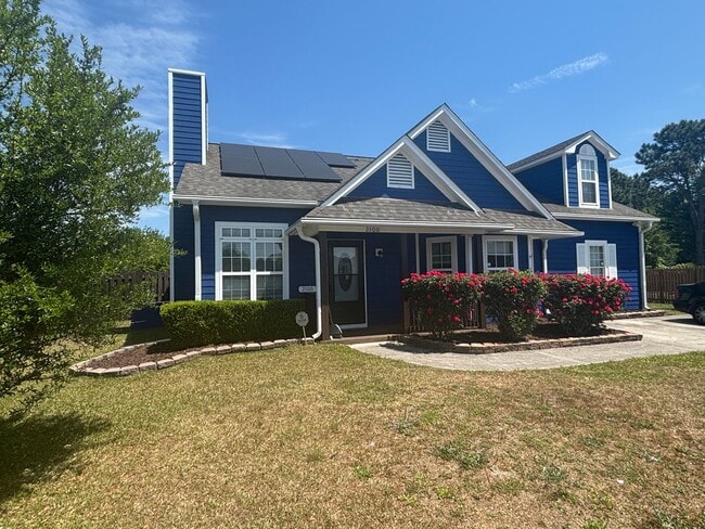 Photo - 4 Bed 2 Bath UNFURNISHED Home with a Loft and Fenced Backyard in Ogden