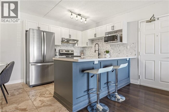 Photo - 1451 Walkers Line Unit 304