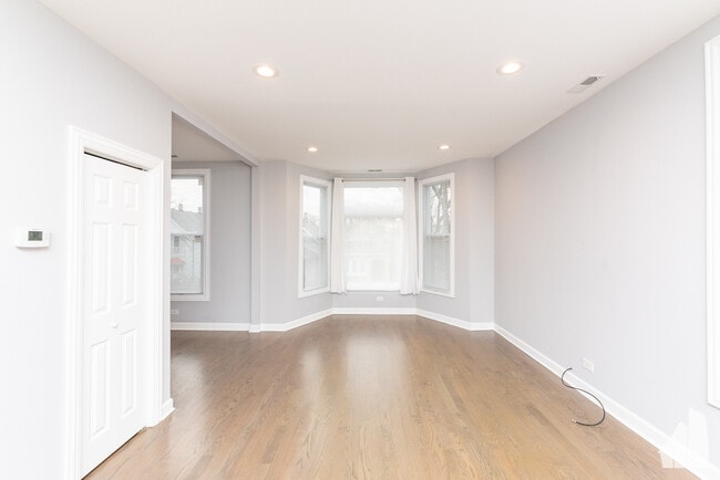 Building Photo - 1821 N Tripp Ave Unit 2