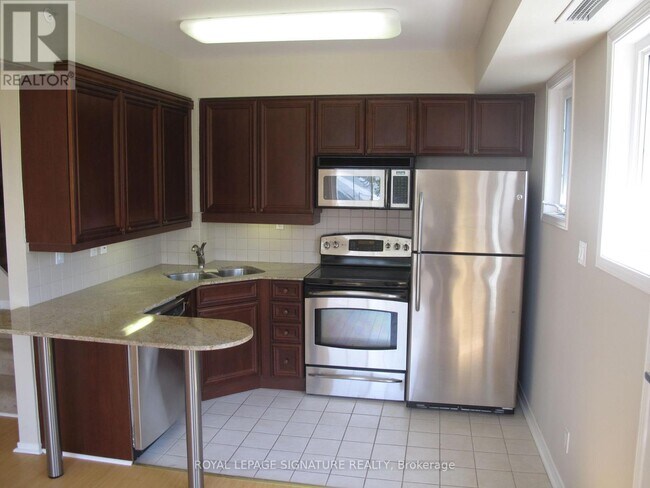 Photo - 1785 Eglinton Ave E