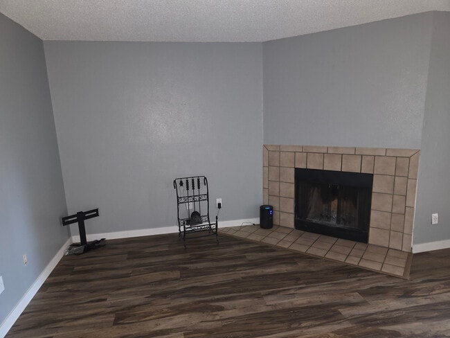 Common area w/Wood burning fireplace - 8910 Fox Dr Unit 14