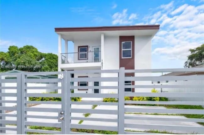 Building Photo - 1831 NW 67th St Unit 1