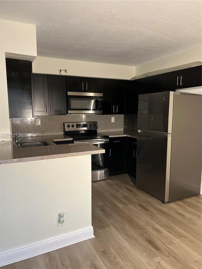 Photo - 11635 Royal Palm Blvd Unit 11635
