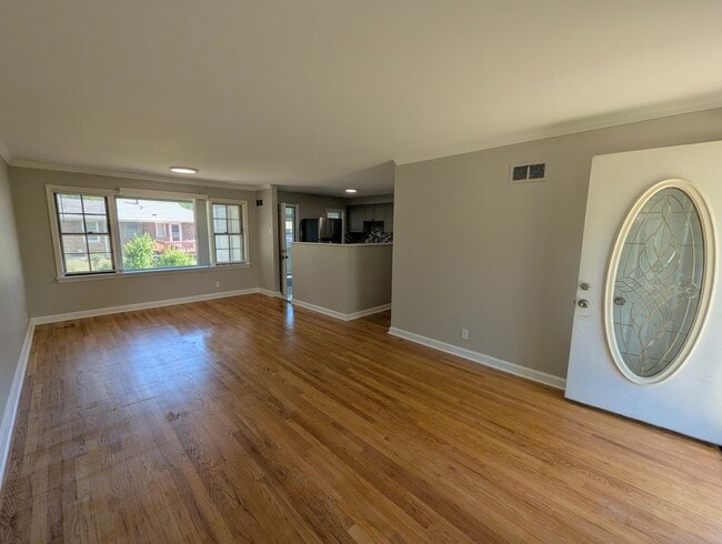 Photo - Updated Open-Concept with Sunroom & Finished Basement Space