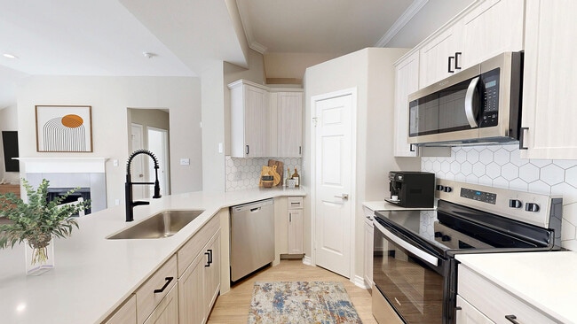 Modern Newly Renovated Kitchen - Lakeside at Coppell Apartments